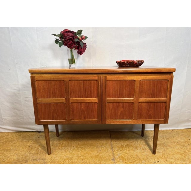 Mid-century retro vintage teak sideboard by nathan 1960s square design • two doors • british design classic a striking...