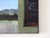 Daytime Secret by Emma Kalff | Oil on panel Painting of a street scene with buildings and mountains. For Sale - Image 4 of 5