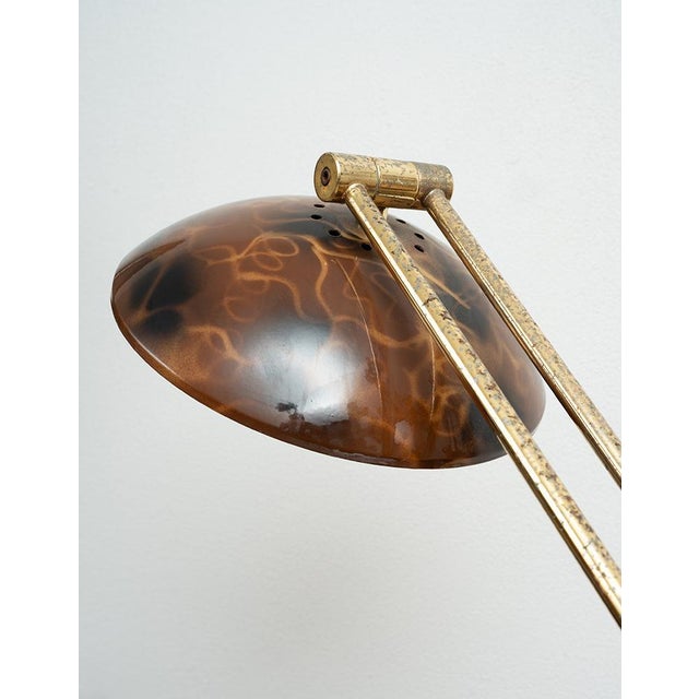 Floor lamp made of brass and celluloid. Origin: Italy, 20th century. Dimensions: Diameter 30 cm, height 150 cm. Document:...