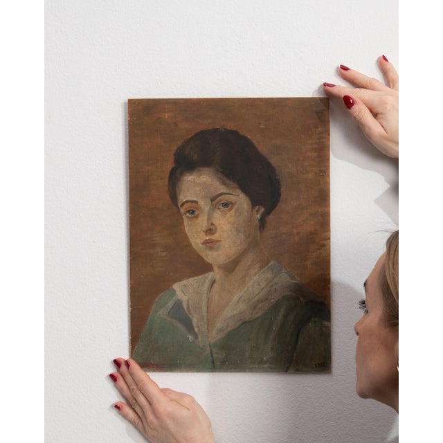 This 1910s painting from France is a painting, housed in a wood frame. Its form follows honest, well-proportioned lines...