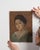 This 1910s painting from France is a painting, housed in a wood frame. Its form follows honest, well-proportioned lines...