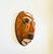 A wonderful vintage terra cotta pottery mask wall hanging. Natural unglazed finish with beautiful hand painted designs...
