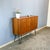 A simple yet elegant sideboard – made in Germany and modernized with 30cm high hairpin legs. Its shallow depth makes it...