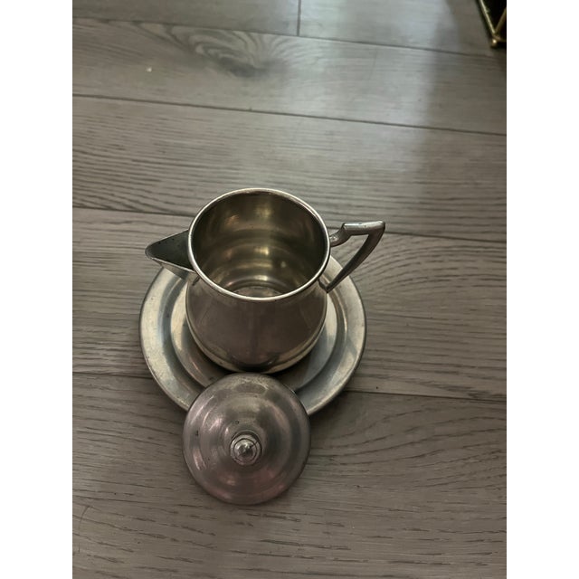 This is a sweet little coffee trio or tea service 3 piece set made from vintage Genuine Pewter metal by the manufacturer...