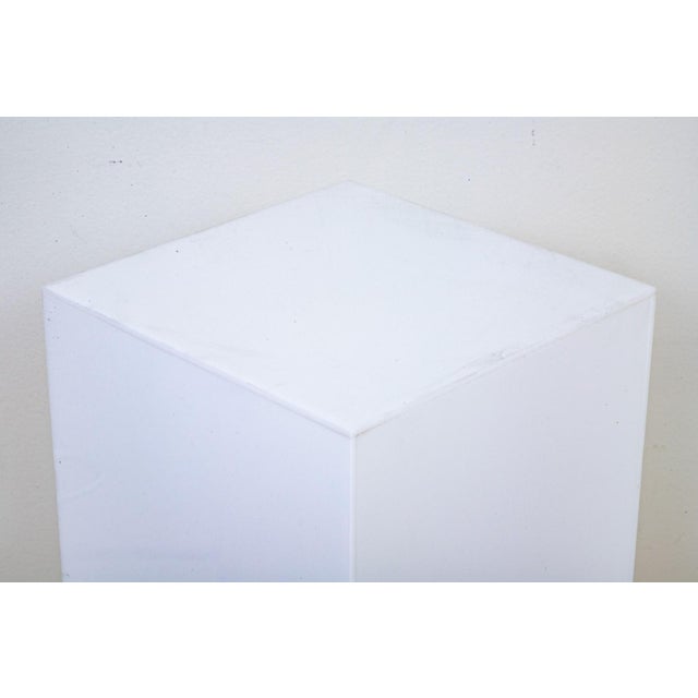 A vintage white acrylic illuminated display pedestal. No maker’s mark. Product Information: Materials: Acrylic Dimensions:...