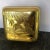 Small tin brass tone misc. box with duck design on top of box. Use for any personal items