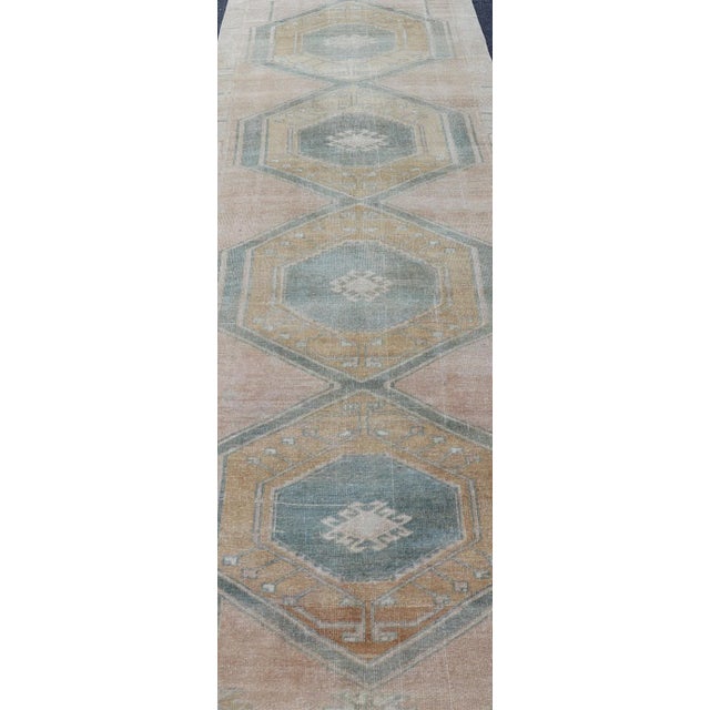 Measures: 3'6 x 12'6 Turkish Vintage Oushak Runner With Medallions and Soft Pastel Colors 3'6 x 12'6. Keivan Woven Arts /...