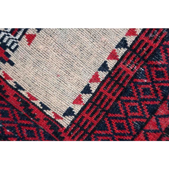Handmade antique Afghan rug from Baluchi region. This prayer rug made in the beginning of 20th century, it is in original...