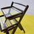A splendid example of vintage design, this food trolley dates back to the 1960s. Crafted from fine wood and glass, it...