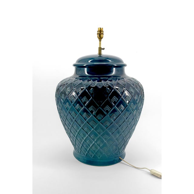 Important blue ceramic lamp, France, Circa 1950s Discover this stunning blue glazed ceramic lamp, a true emblem of...