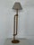 This floor lamp is Swedish in origin and dates from the 1970s. The solid pine frame is built from turned rods bent into a...