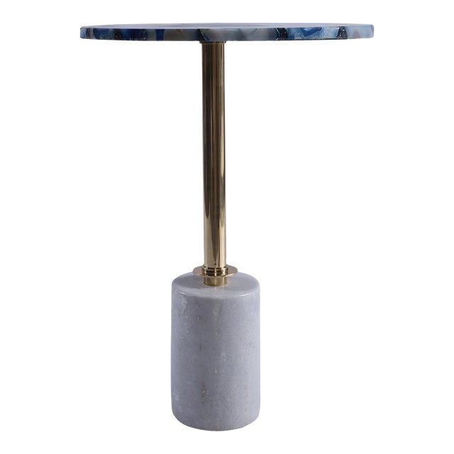 This petite piece of functional art features a captivating blue agate stone tabletop that's as much a work of art as it is...