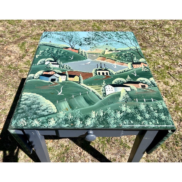 Live your fantasy! A spectacular, one of a kind work of art. Oil painted wood table with one drawer. The scene depicts a...