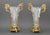 Pair of Louis XVI Style Ormolu Mounted Crystal Vases, each with two laurel wreath form articulated handles. 21" H x 15" W...