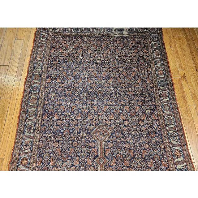This 19th Century Persian Farahan rug is an exceptional example of finely handwoven craftsmanship from Western Persia,...