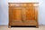 A sideboard/buffet in walnut, c. 1880, Italian. Features three drawers with dovetail joints. Two drawers have matching...