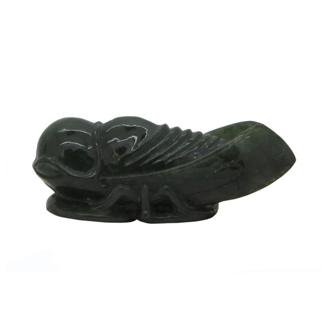 This beautiful pendant is carved from natural untreated jade, the motif of this pendant is a cicada. Cicada is the symbol...
