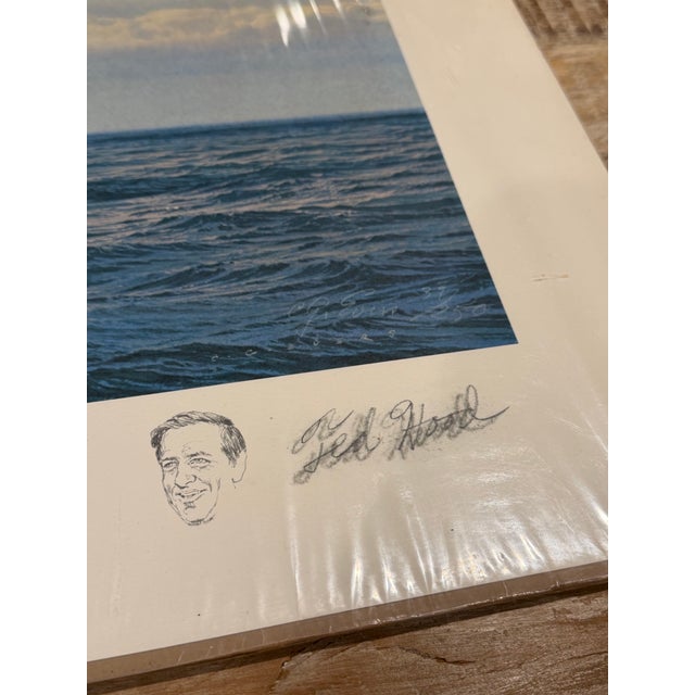 A vintage 1975 America’s Cup commemorative print, depicting the iconic 1974 race and published by Greenwich Workshop, Inc....