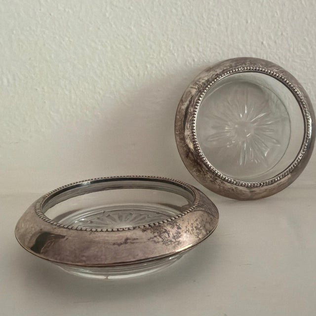 This set of 2 Frank M Whiting Sterling & Crown drink coasters or ashtrays is made of sterling silver (.925) with a...