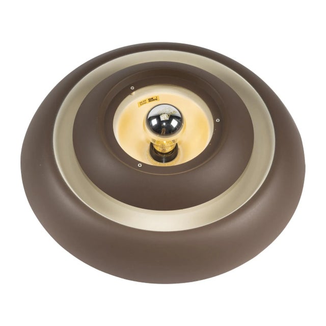 Brown Ceiling or Wall Lamp from Dijkstra Lampen, in Flawless conditions. Designed 1970 to 1979 This piece has an...