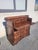 Baroque-style carved chest of drawers with writing desk. Removable top, 8 drawers inside. The front panel features three...