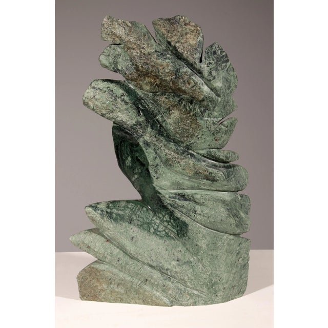 This stunning Carrara marble sculpture, crafted by the renowned artist Armando Rosato in 1977, is a testament to his...