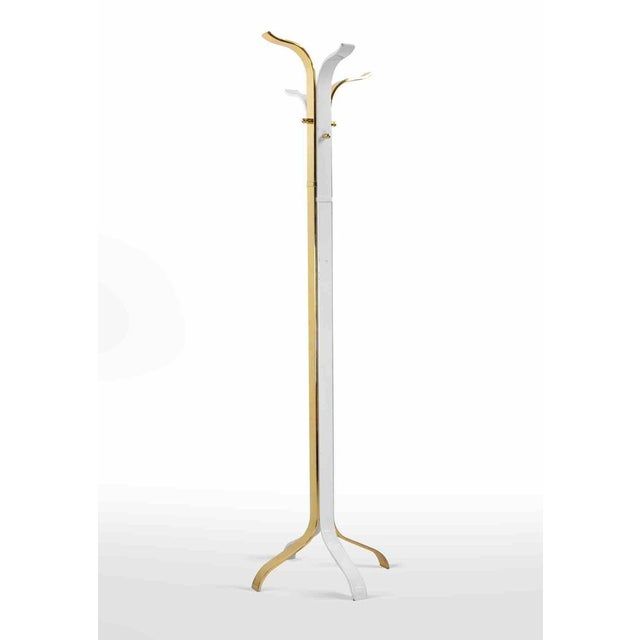 Vintage Mid-century Coat Hanger in golden and lacquered metal. Good condition except for some minor scratches.