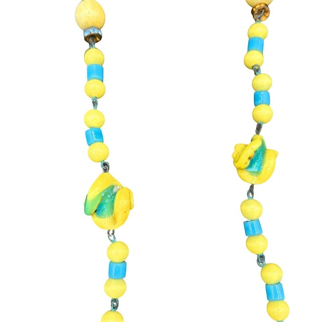 Czechoslovakian Art Deco era yellow,, white & blue bohemian Art Glass bead necklace. This stunning necklace is a beaded...