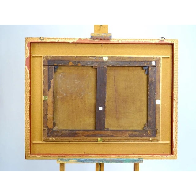 The painting in question depicts a hill landscape with in the foreground a dog with a white and brown coat, lying on a...