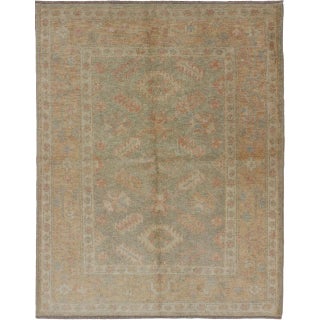Turkish Oushak Rug in Soft Sage Green, Muted Terracotta, and Faded Blue Accents 4' X 5'3" For Sale