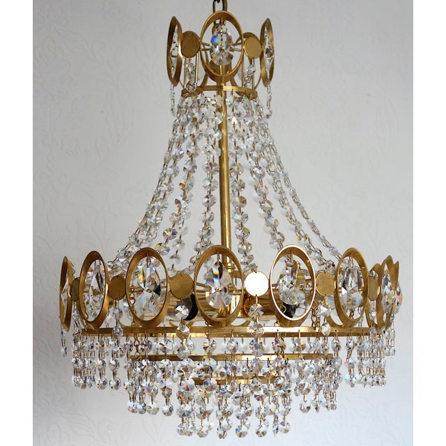 Brass and Lead Crystal 4-Light Chandelier from Weinfurtner, 1970s, in Very Good conditions. Designed 1970 to 1979 European...
