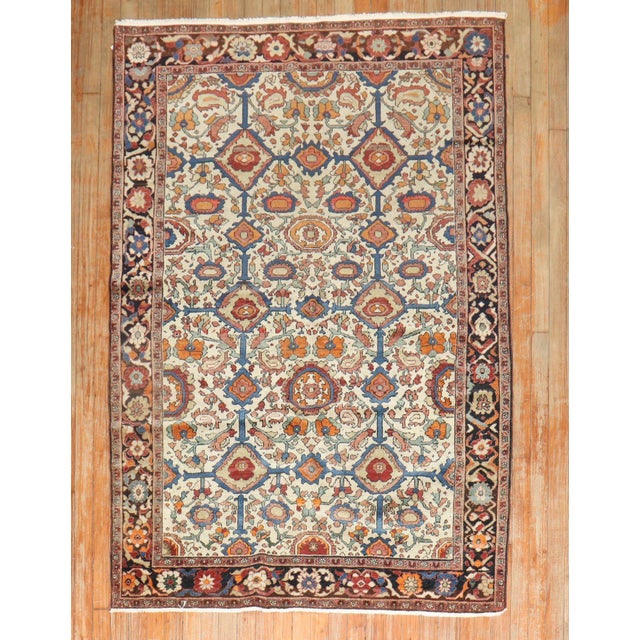 1920s Persian Malayer rug featuring an all-over design on an ivory field Details rug no. j2608 size 4' 2" x 6' 3" (127 x...