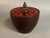 Hand turned walnut and enameled covered vessel. It still retains its BIG red label on the bottom, Capital Enterprise...