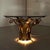 Very special coffee / side table in the style of Silas Seandel / Paul Mierenhout. Brutalist shaped dark brass table with...