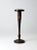 An elegant late 19th-century pedestal stand with a tall, tapered wood column, turned details and a rich dark finish. Hand-...