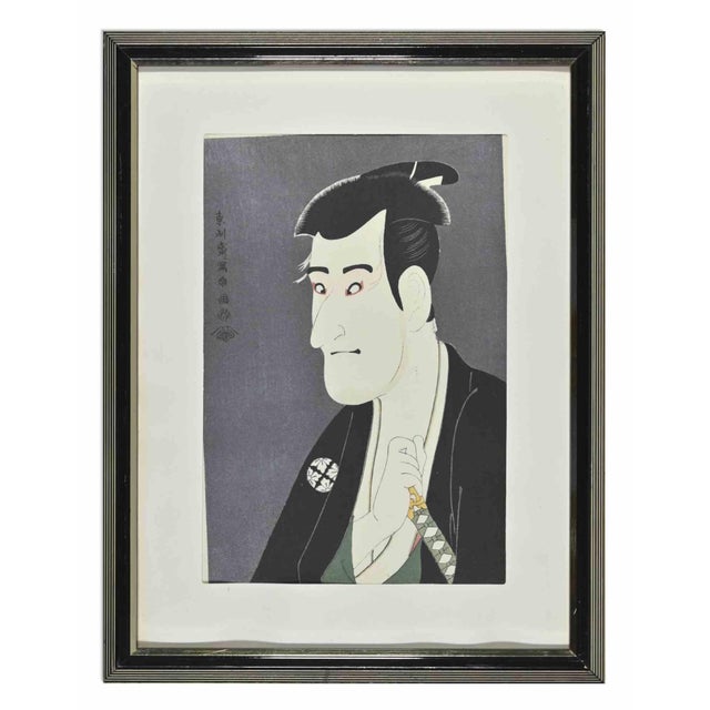 A Man Portrait is an artwork realized after Toshusai Sharaku (active 1794–1795). Woodcut, 30 x 20 cm, with frame. Good...