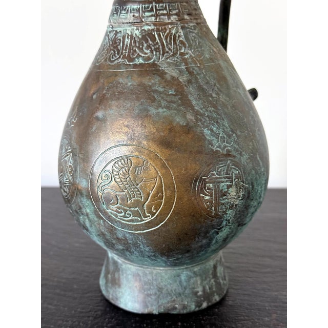Medieval Islamic Bronze Ewer with Incised Motifs Seljuk Empire For Sale - Image 10 of 18