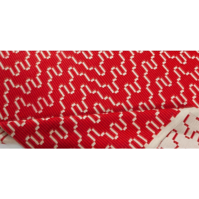 Vintage flat woven double sided red rug Size: 9'8" × 10'3" (294 × 312 cm) This captivating vintage flat-weave rug,...