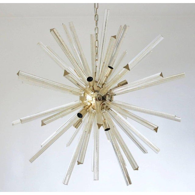 Italian Sputnik chandelier with clear infused with gold flecks Murano glasses hand blown into three points using Triedri...