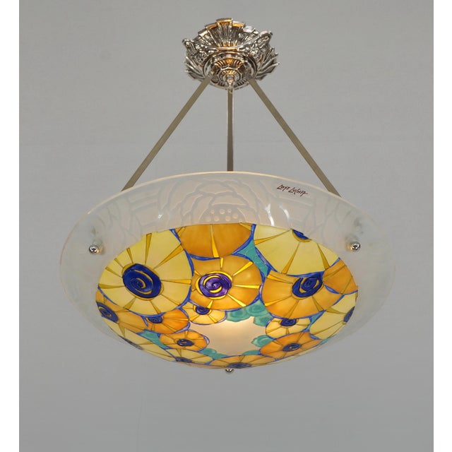 LOYS LUCHA A French 1930s art deco pendant light in nickel plated solid brass or bronze holding a bowl by the glass...