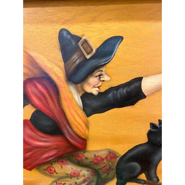 Charming original hand painted wood panel by Bonnie Barrett of a witch with a cat on broomstick. Hand signed on front...