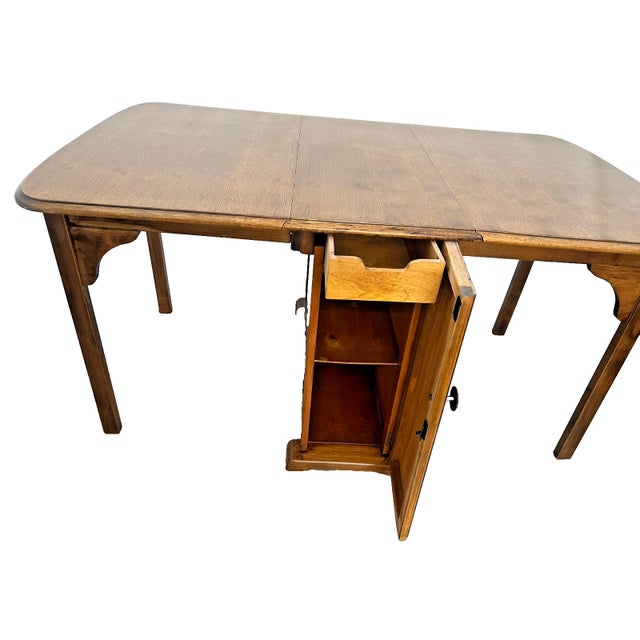 Gorgeous Rare Vintage Rectangle Gate Leg Table with two drawers and double sided access cabinet. Solid Oak Construction...