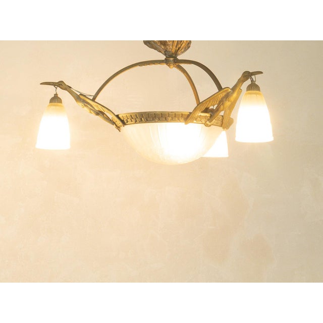 1920s Art Deco ceiling light Width: 70 cm Height: 40 cm Depth: 70 cm This piece has been carefully cleaned and is in good...
