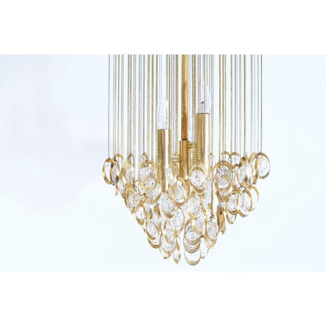 Unique extra large chandelier made up of 90 handblown green Murano glass tubes in various green shades hanging from gold...