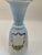 Beautifully decorated sky-blue and white French Art Deco vase with hand-decorated floral motif with gold gilt accents....