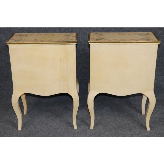 Dimensions: 27.5 inches high x 19.25 inches wide x 12.5 inches deep A beautifully decorative and finely crafted pair of...