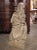 Carved Italian Limestone Statue of a Woman Holding a Bird For Sale - Image 10 of 13