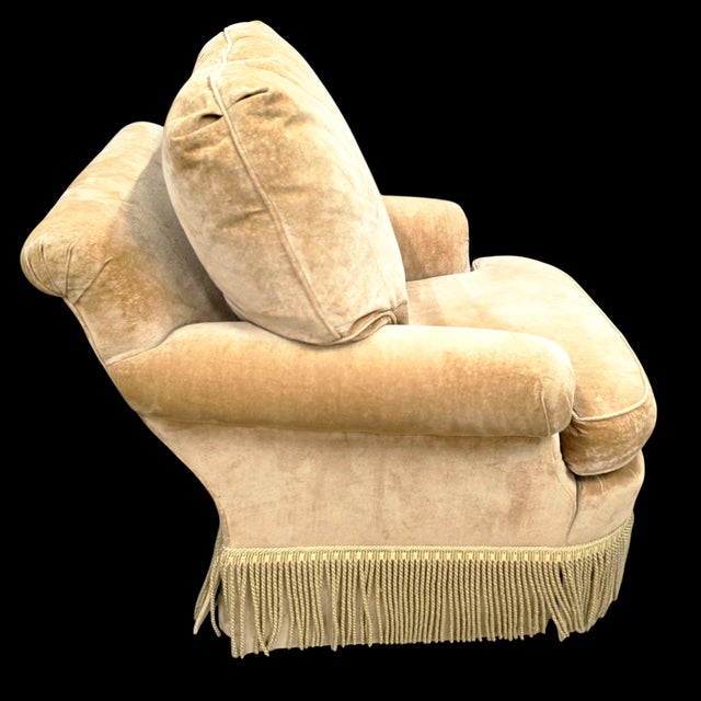 Featured is a Vintage Baker Furniture Lounge Chair with Skirted Fringe Detailing.It is a sumptuous example of...