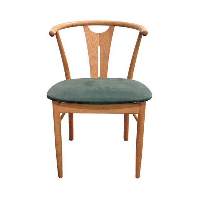 Vintage Danish modern-style solid oak dining chairs with rounded "wishbone" backs in the manner of K. Høffer-Larsen's...