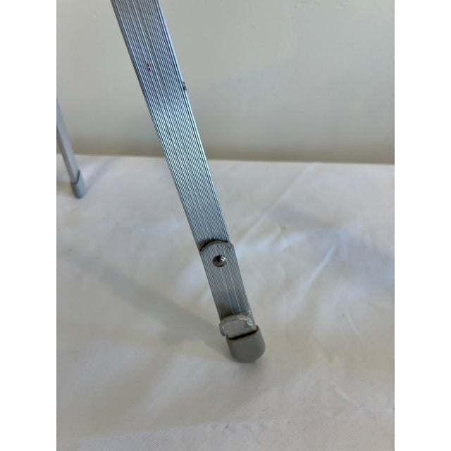 A vintage adjustable metal book stand featuring a clean, functional design and lightweight construction. Made in the USA,...